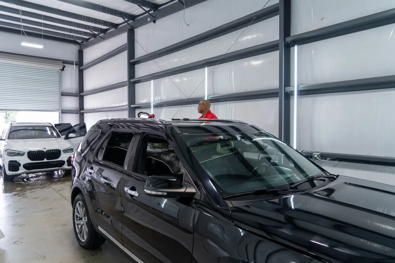 A vehicle under inspection after a storm